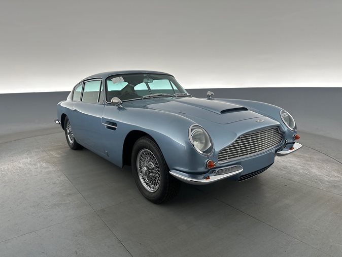 View blue 1969 Aston Martin DB6 available via auction.