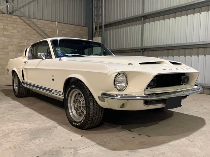 View a white 1968 Ford Shelby GT500 and others available via auction.