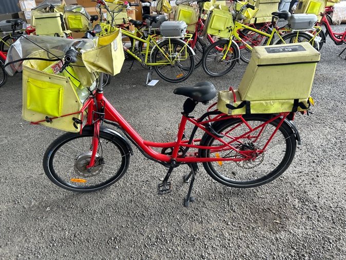 View a range of electric postie bikes available via auction.