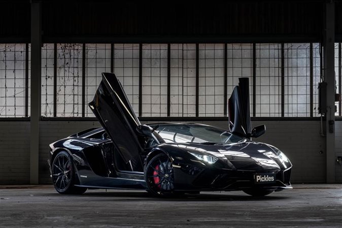 View black Lamborgini available via auction.